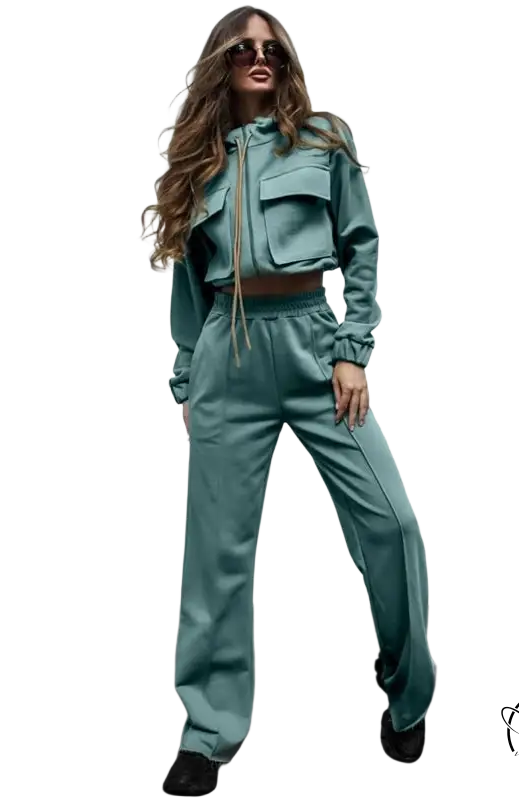 Woman in teal tracksuit elegant vetements suit with long sleeve