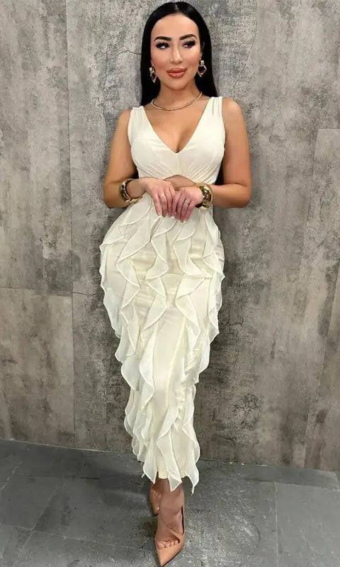 Enchanting ruffled split dress in cream with deep V-neck and high-low hem