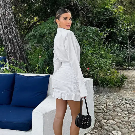 Elegant woman in stunning white cotton linen langry fashion dress