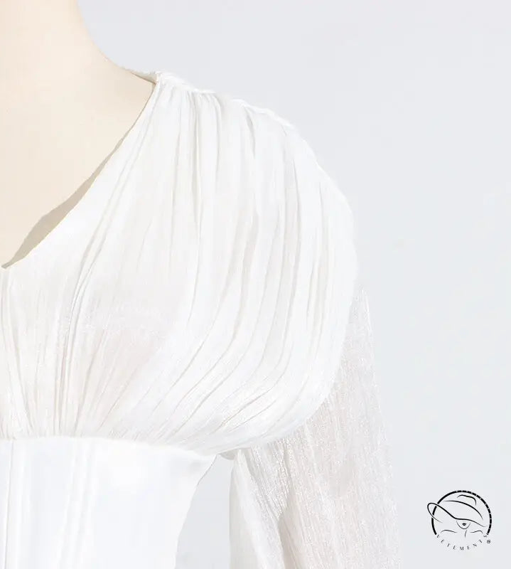 White langry fashion blouse with ruffled sleeves and v-neckline