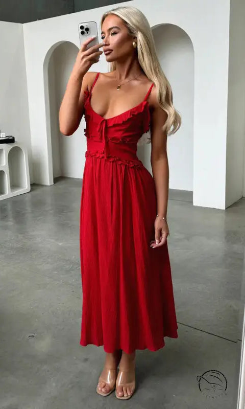Elegant red loose dress with spaghetti straps and fitted bodice
