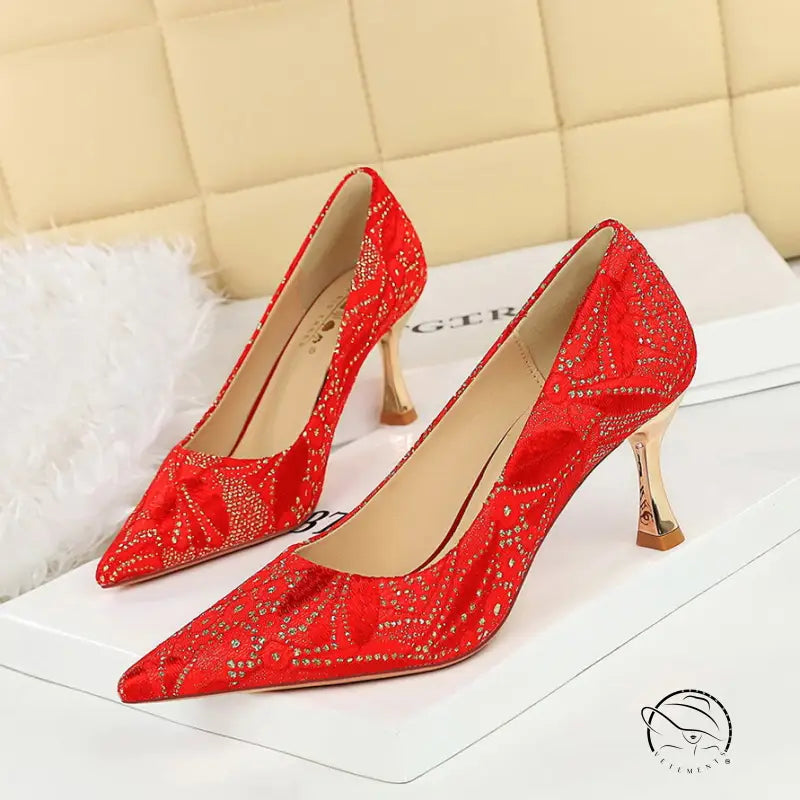 Langry fashion red high-heeled shoe with rhinestone detailing and pointed toe