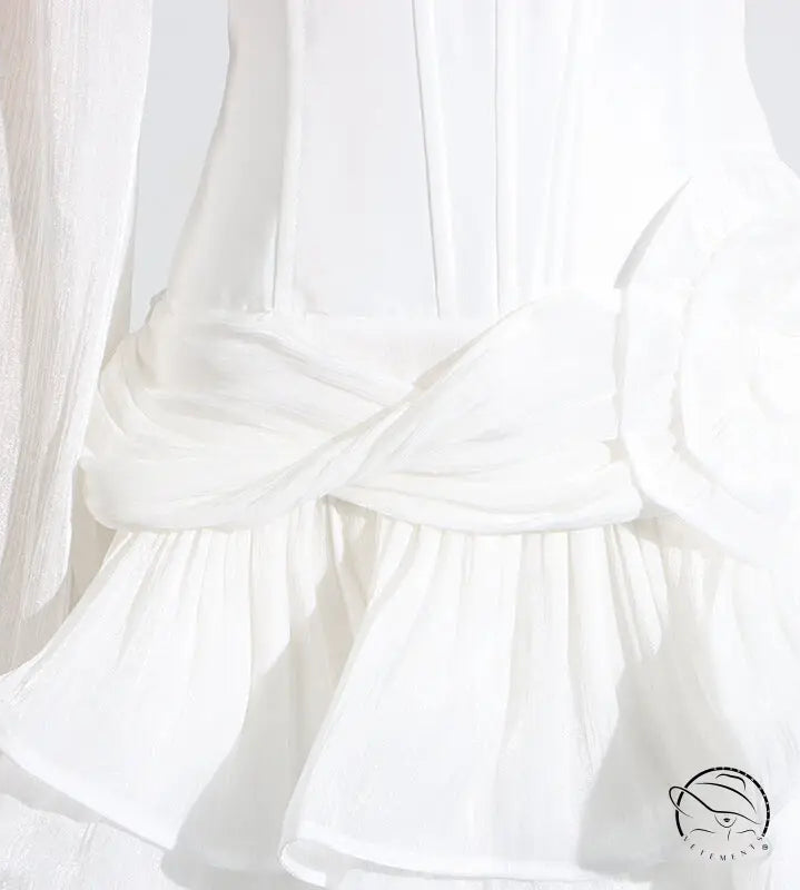 Elegant white ruffled blouse with bell sleeves in Langry fashion ملابس