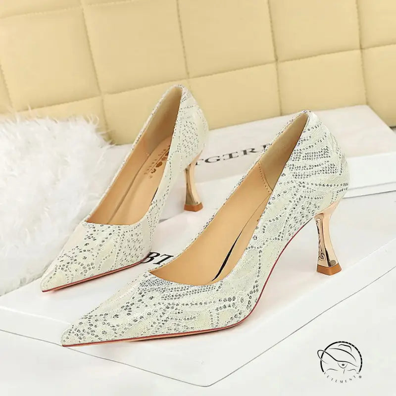 Elegant white snakeskin high heel pumps with rhinestone accents in langry fashion