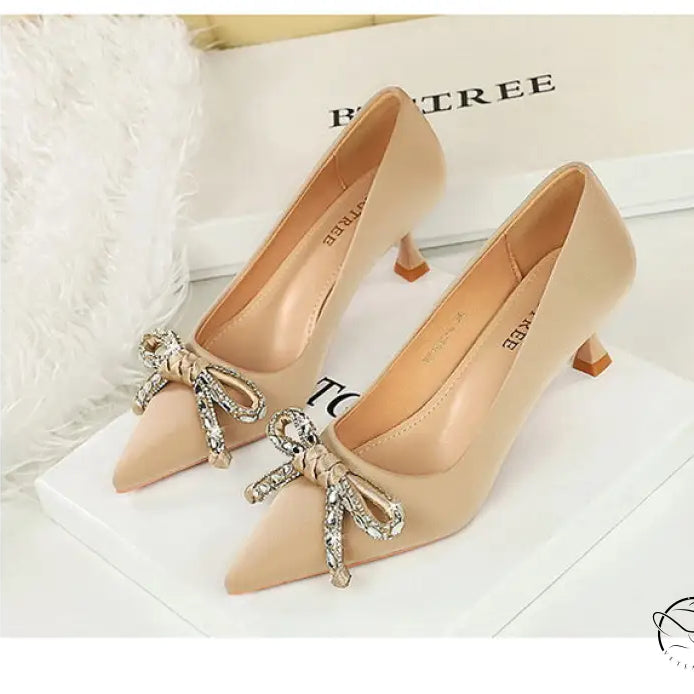 Langry fashion beige stiletto heels with rhinestone bow details