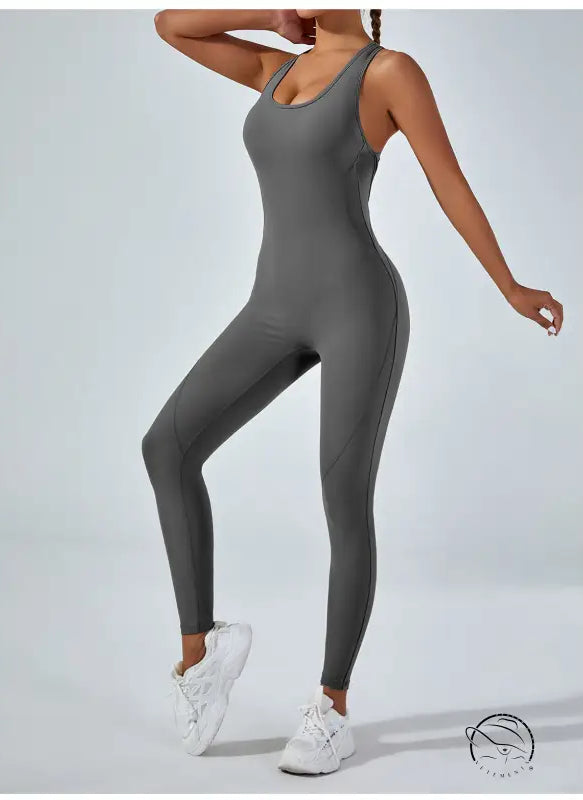Sleek gray langry yoga one-piece jumpsuit with racerback design