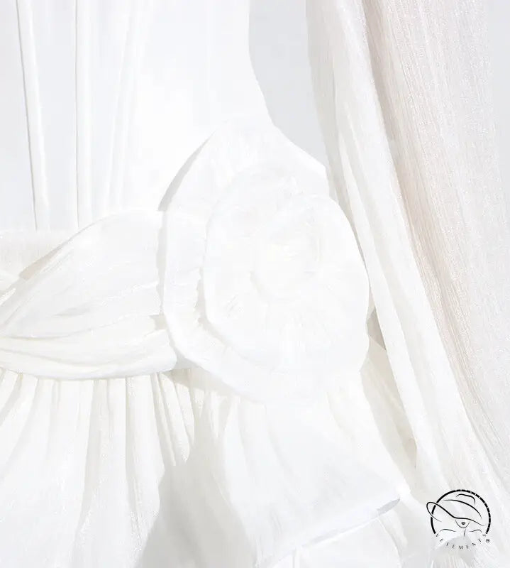 White ruffled langry fashion blouse with long sleeves and gathered neckline
