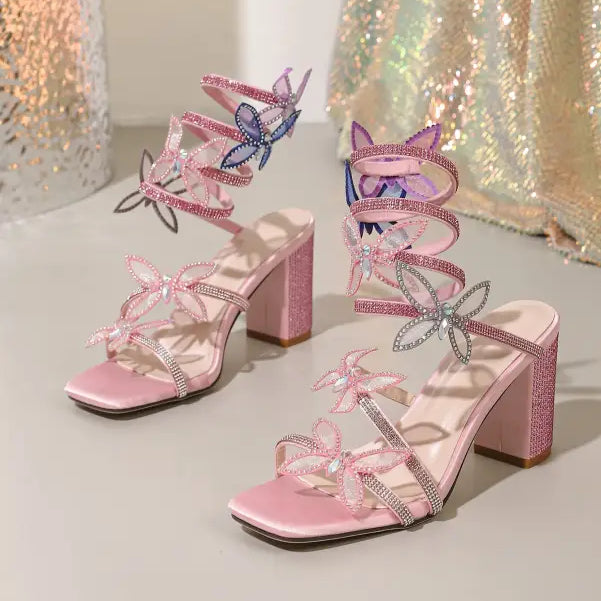 Pink glittery langry fashion stiletto heels with rhinestone bow and butterfly accents