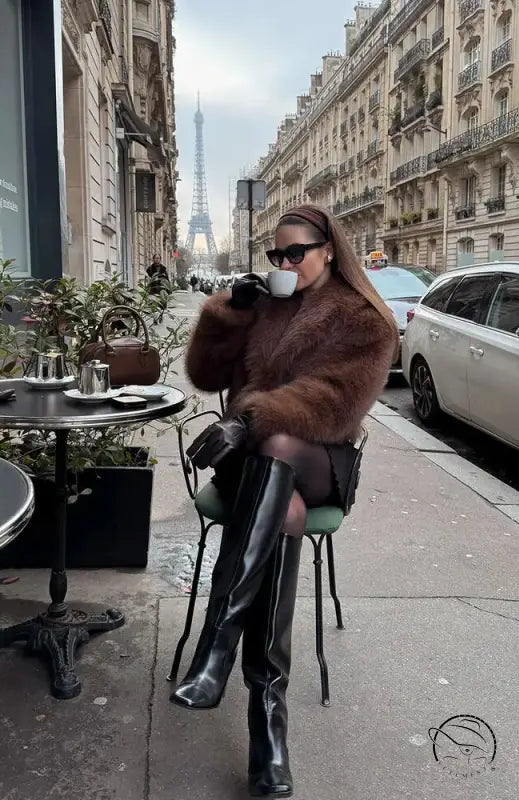 Gorgeous faux fur fox jacket with black leather pants and boots
