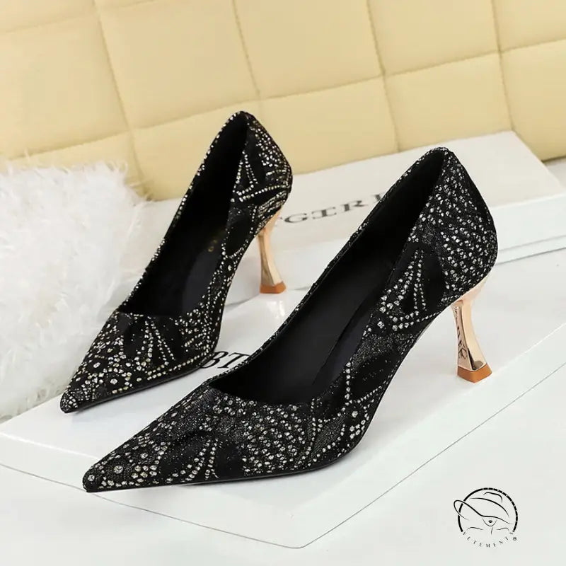 Black glitter high heel shoes with gold accents in Langry fashion
