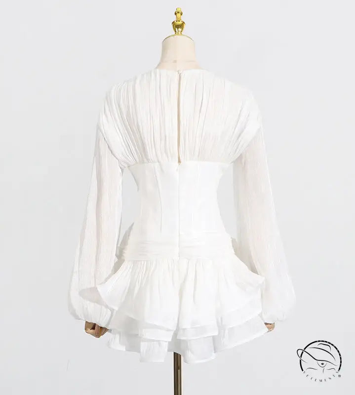Elegant white ruffled langry blouse in fashion ملابس style