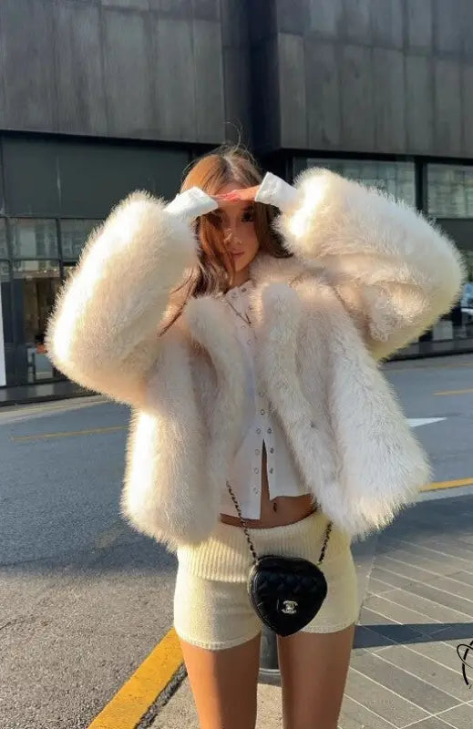 Short loose casual faux fur coat by Langry, cream fluffy cropped design