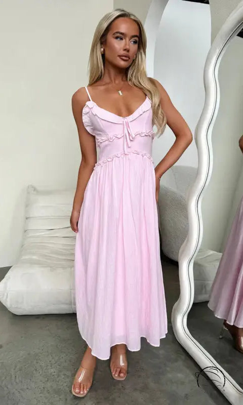 Elegant loose dress: light pink midi sundress with spaghetti straps
