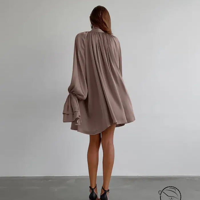 Elegant thick matte satin dress in flowy mauve with billowing long sleeves and gathered back