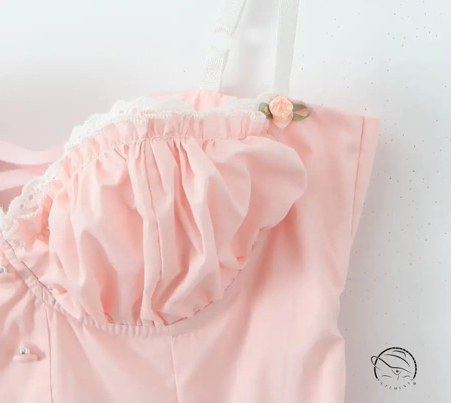 Enchanting steel bracket short dress in pale pink with ruffles and rosebud