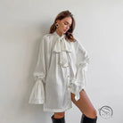 Elegant white satin dress with oversized bow-tie and bell sleeves by Langry fashion