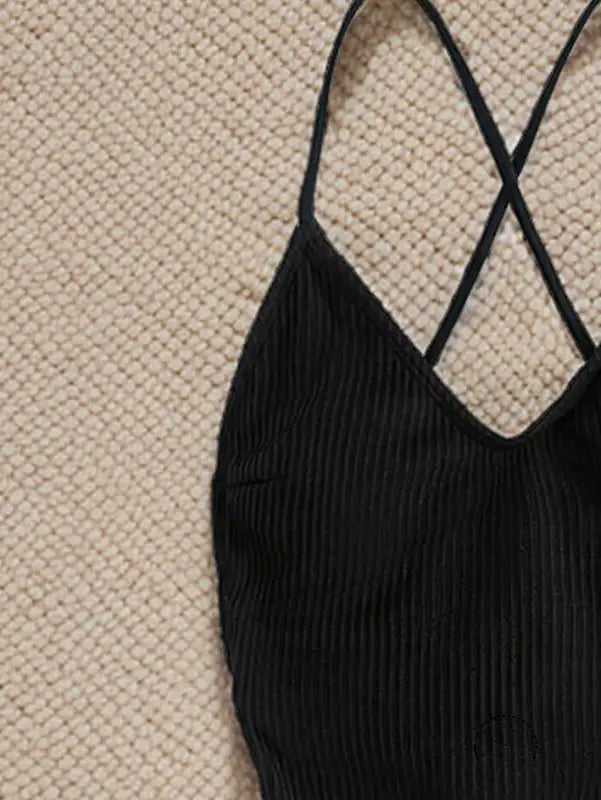 Black ribbed one piece bikini with thin cross-back straps