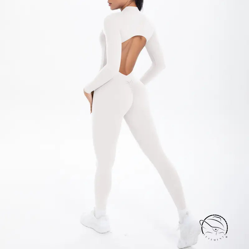 Long sleeve white yoga top with back cutout and matching leggings