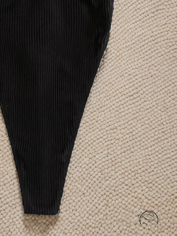 Black ribbed fabric sleeve for attractive one piece bikini fashion