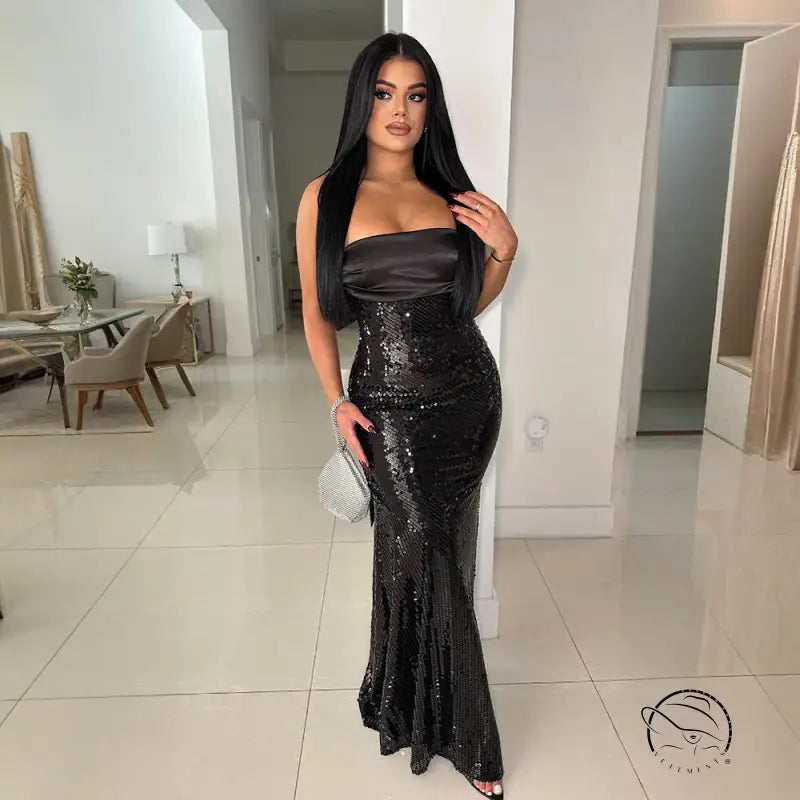 Elegant black sequined gown with amazing satin stitching