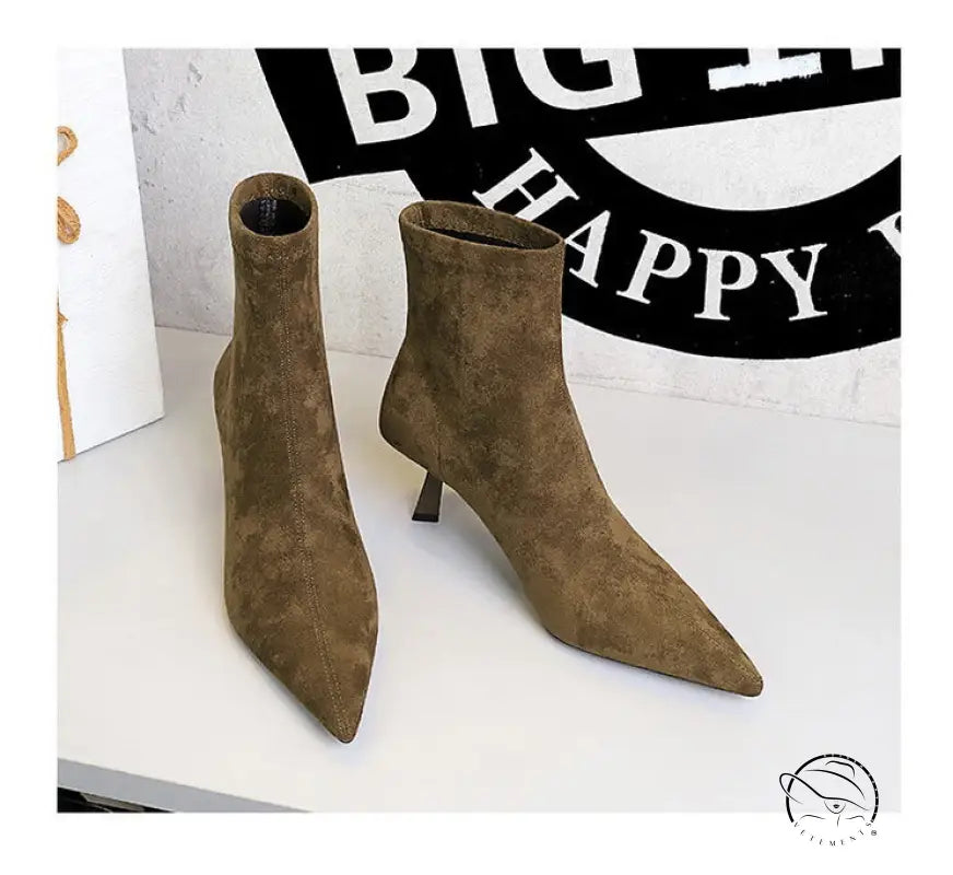 Brown suede ankle boots with pointed toes and low heels in Langry fashion