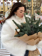 Gorgeous faux fur fox jacket in white with brown accents and gold trim from Langry fashion
