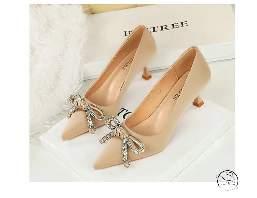 Langry fashion beige stiletto heels with rhinestone bow details