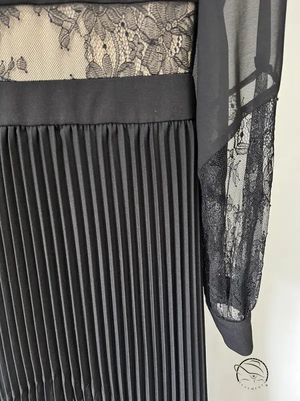 Elegant black pleated langry fashion dress with lace detailing, floor length