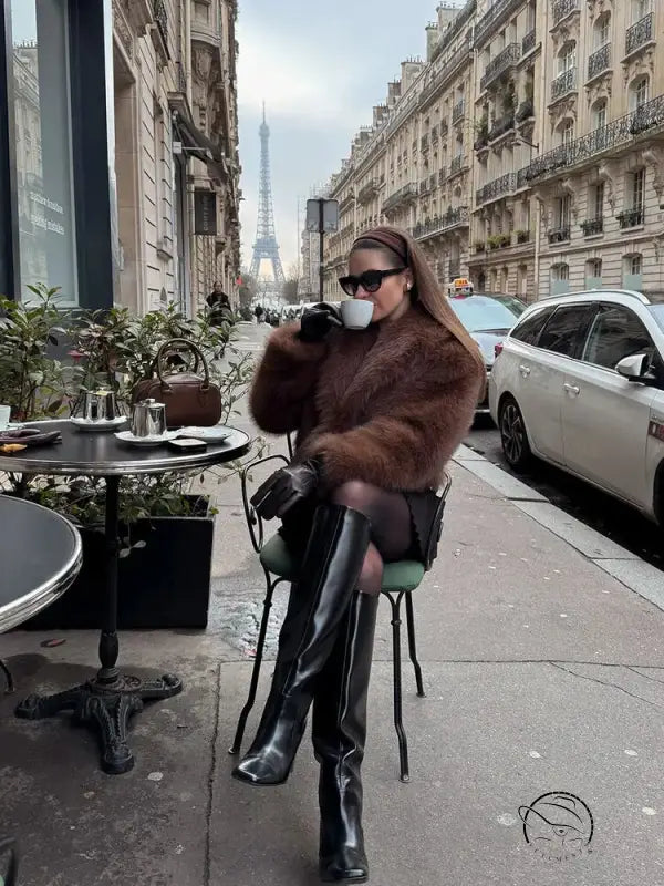 Gorgeous faux fur fox jacket with black leather pants and boots