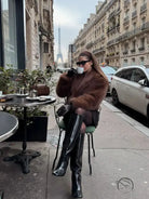 Gorgeous faux fur fox jacket with black leather pants and boots