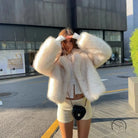 Short loose casual faux fur coat by Langry, cream fluffy cropped design