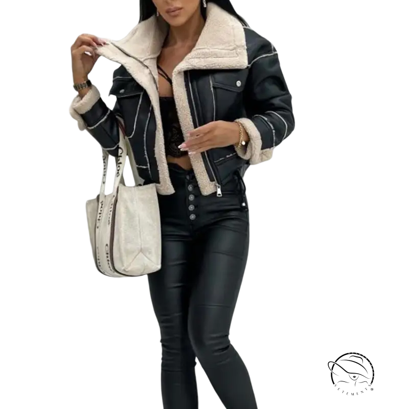 Woman in attractive faux shearling jacket with fur trim and pants