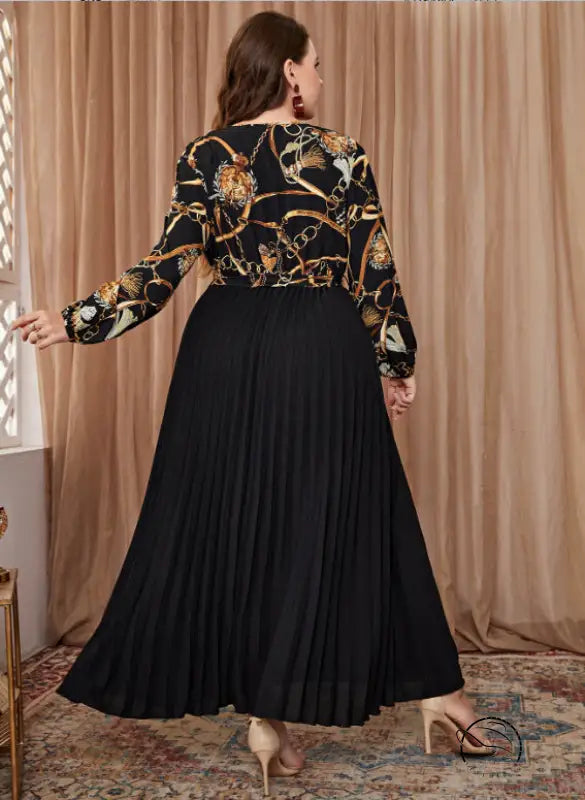 Black pleated maxi evening dress with chain print top