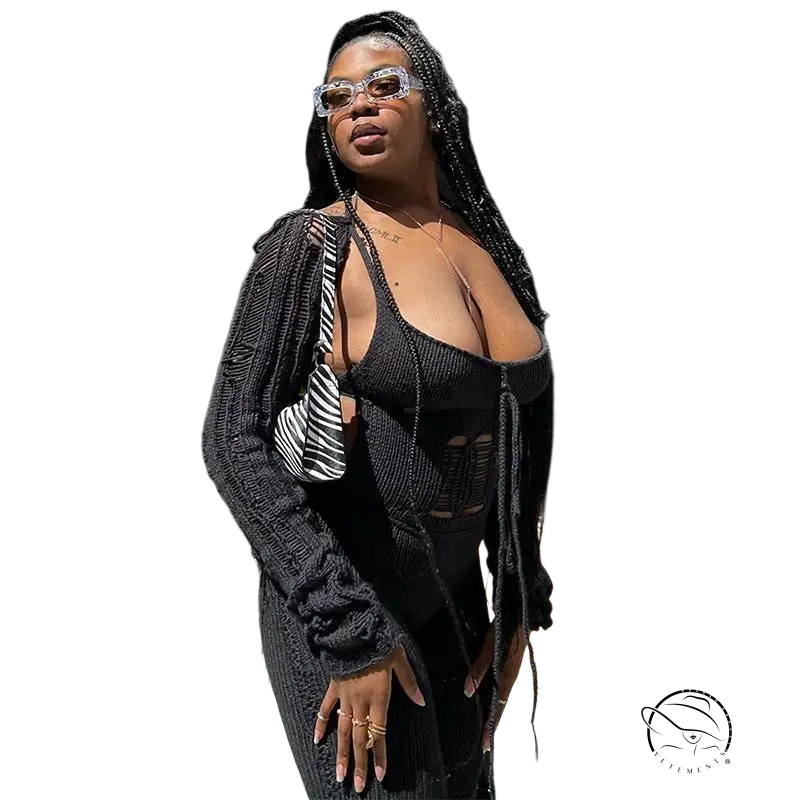 Black knitted cardigan with woolen cutout jumpsuit and tassels